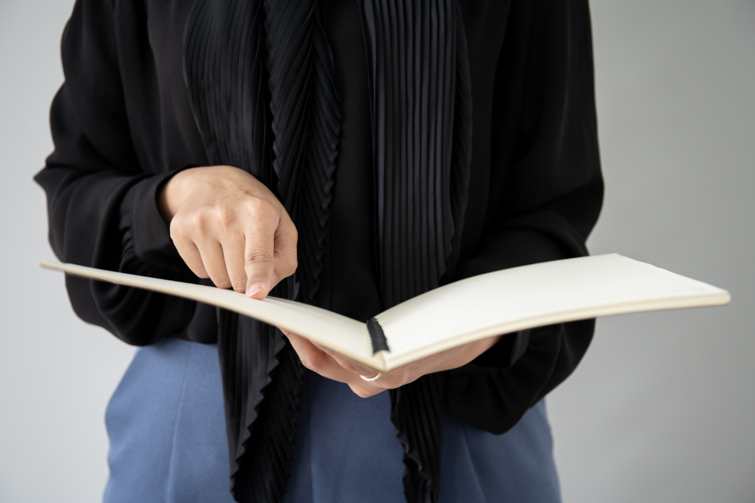 portrait muslim student holding book